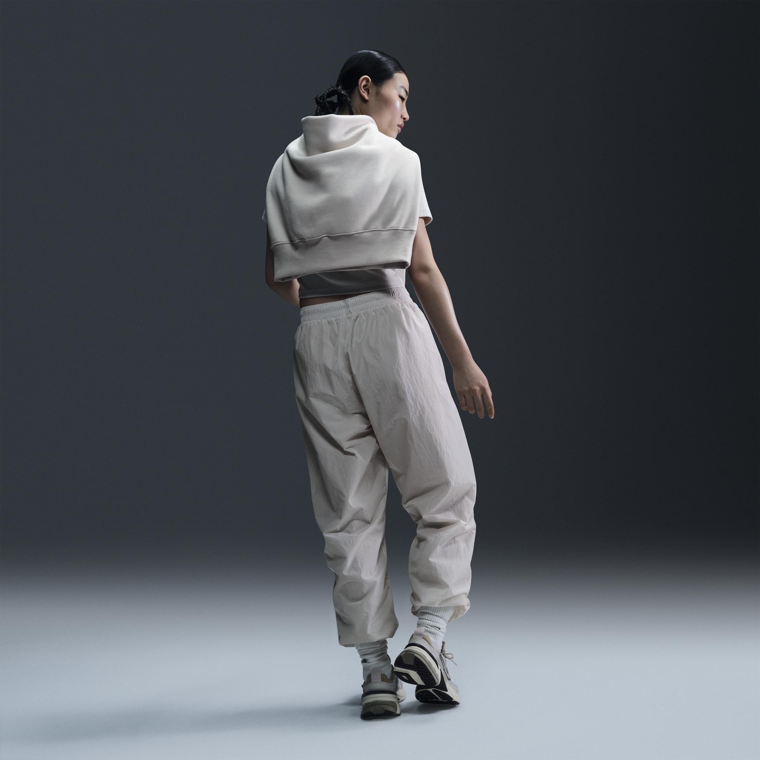 Womens Nike Sportswear Essential Mid-Rise Oversized Woven Jogger Pants Product Image