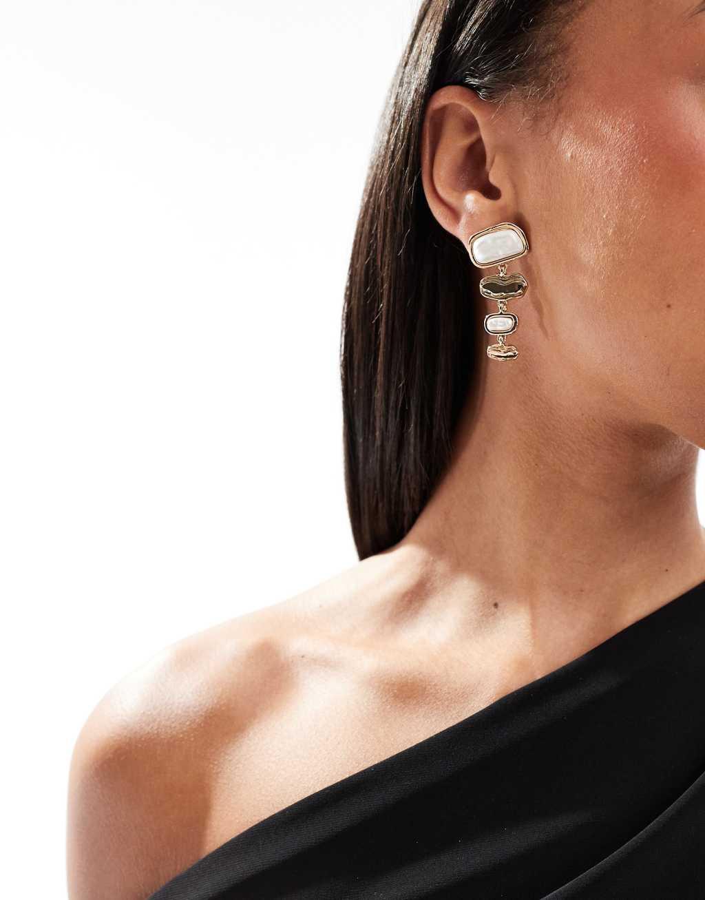 ASOS DESIGN drop earrings with faux pearl and molten detail in gold tone Product Image