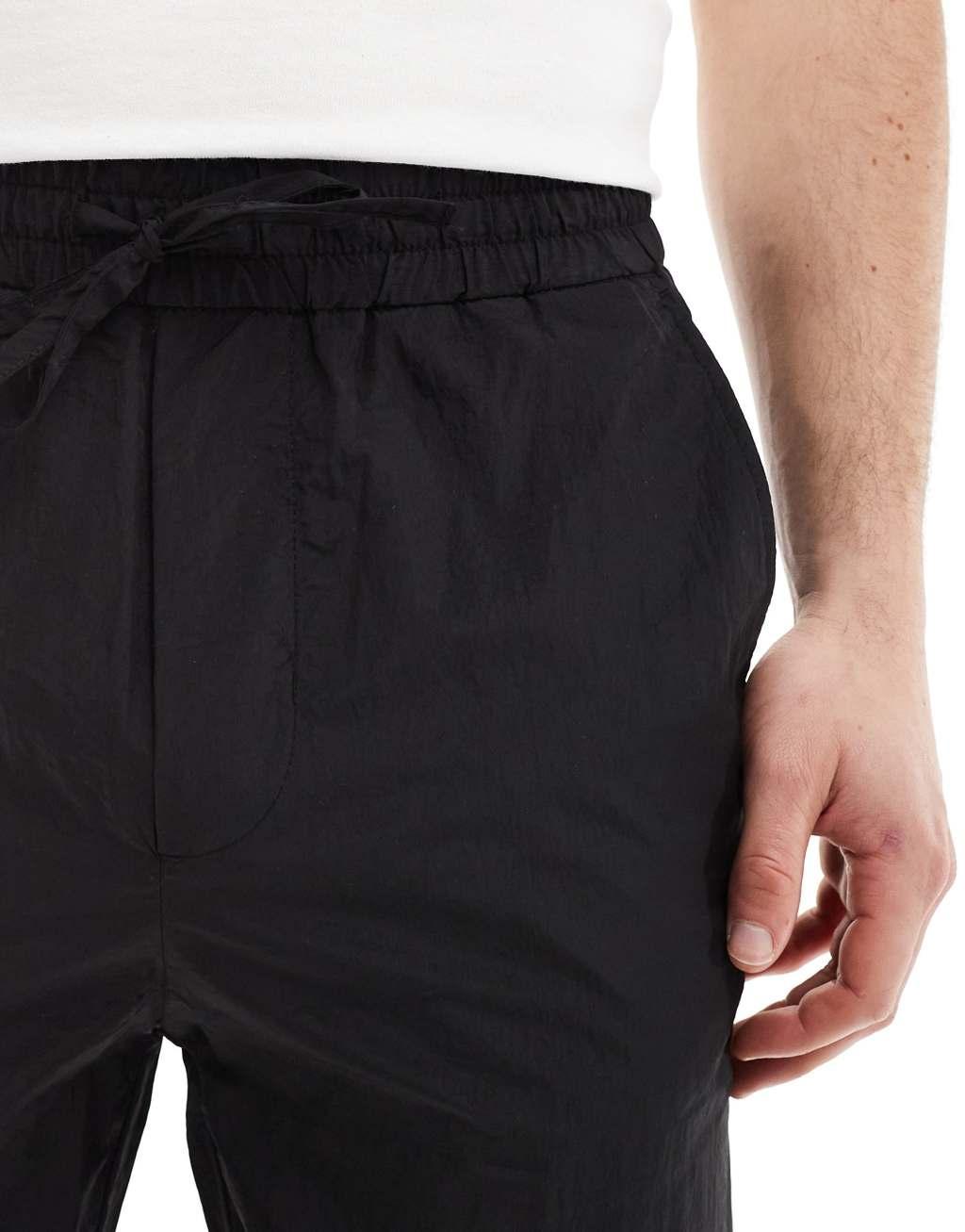 ONLY & SONS loose fit tech pants in black Product Image