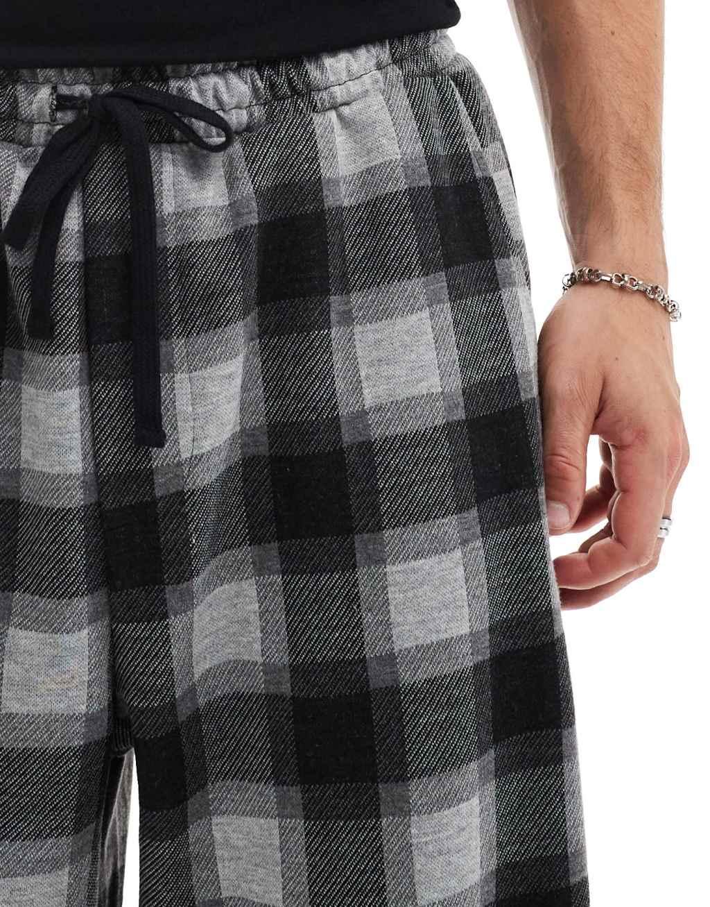 Pull&Bear wide leg skate plaid pants in black Product Image