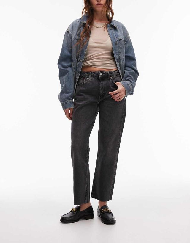 Topshop cropped mid rise straight jeans with raw hems in washed black Product Image