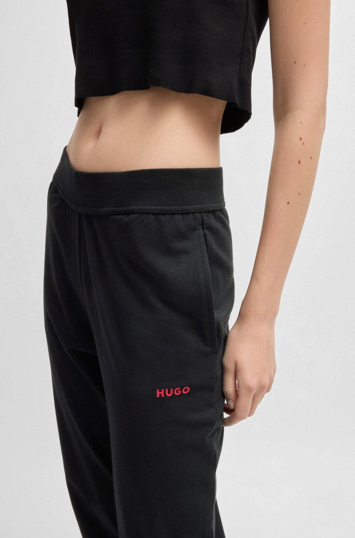 Relaxed-fit tracksuit bottoms with printed logo Product Image