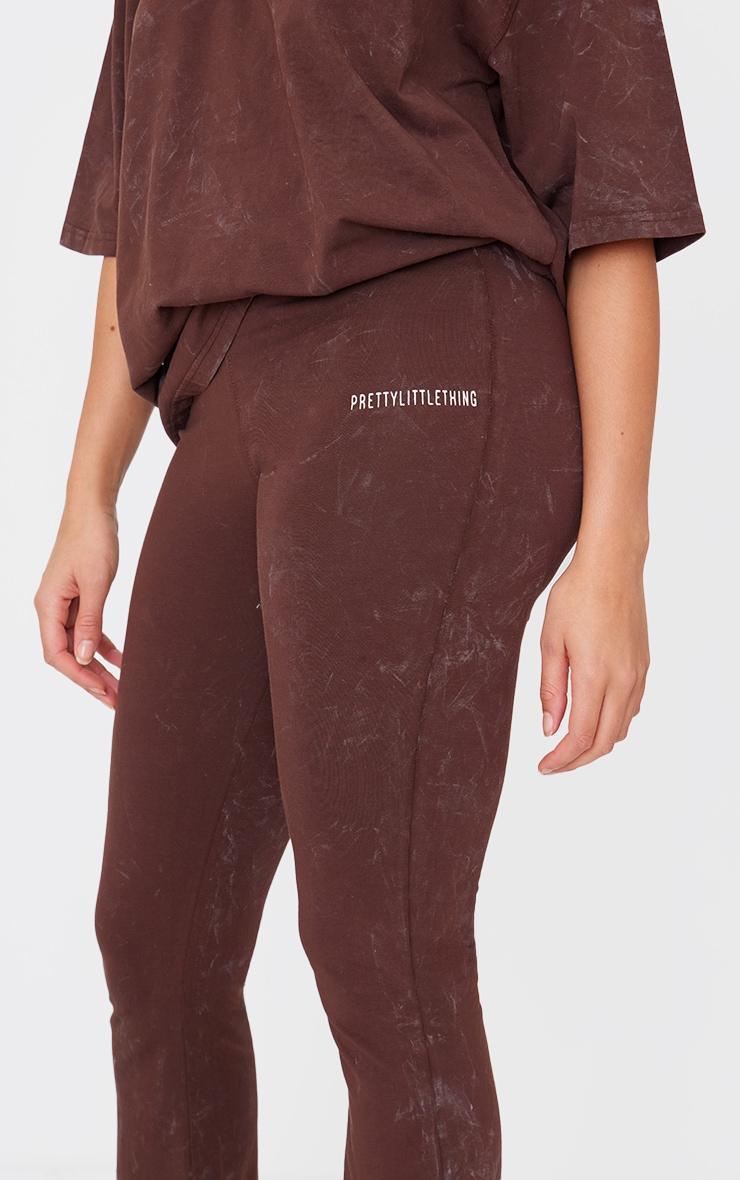 PRETTYLITTLETHING Chocolate Print Washed High Waist Flared Pants Product Image