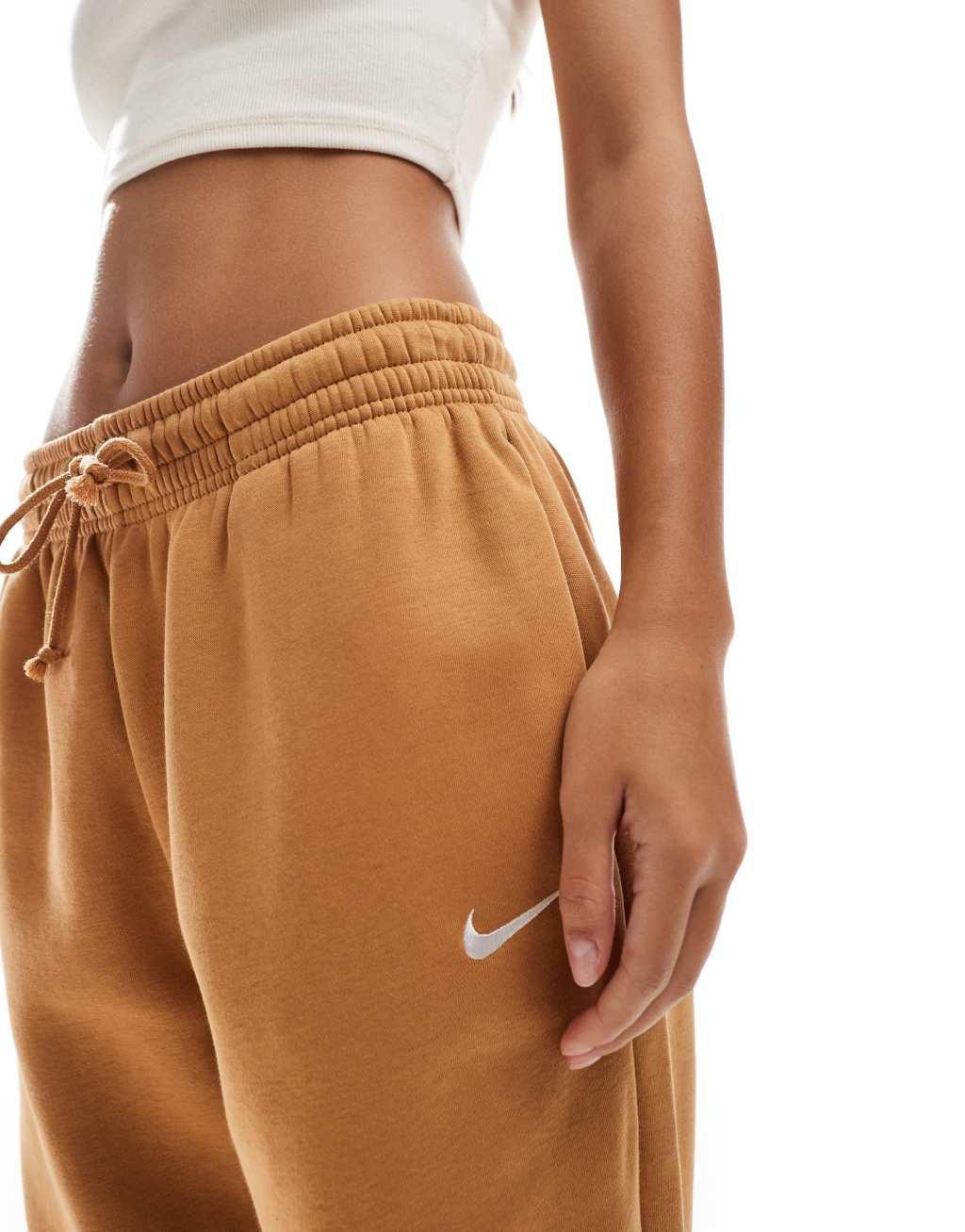 Nike Phoenix Fleece high waisted sweatpants in brown Product Image