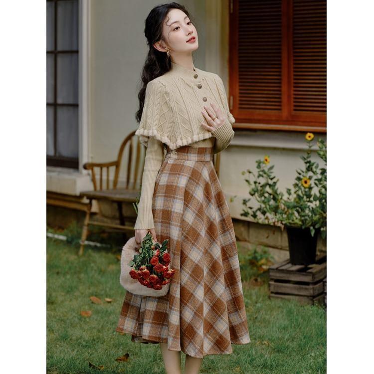 Set: Long-Sleeve Plain Knit Top + Stand Collar Button-Up Capelet + High Rise Plaid Midi A-Line Skirt Product Image