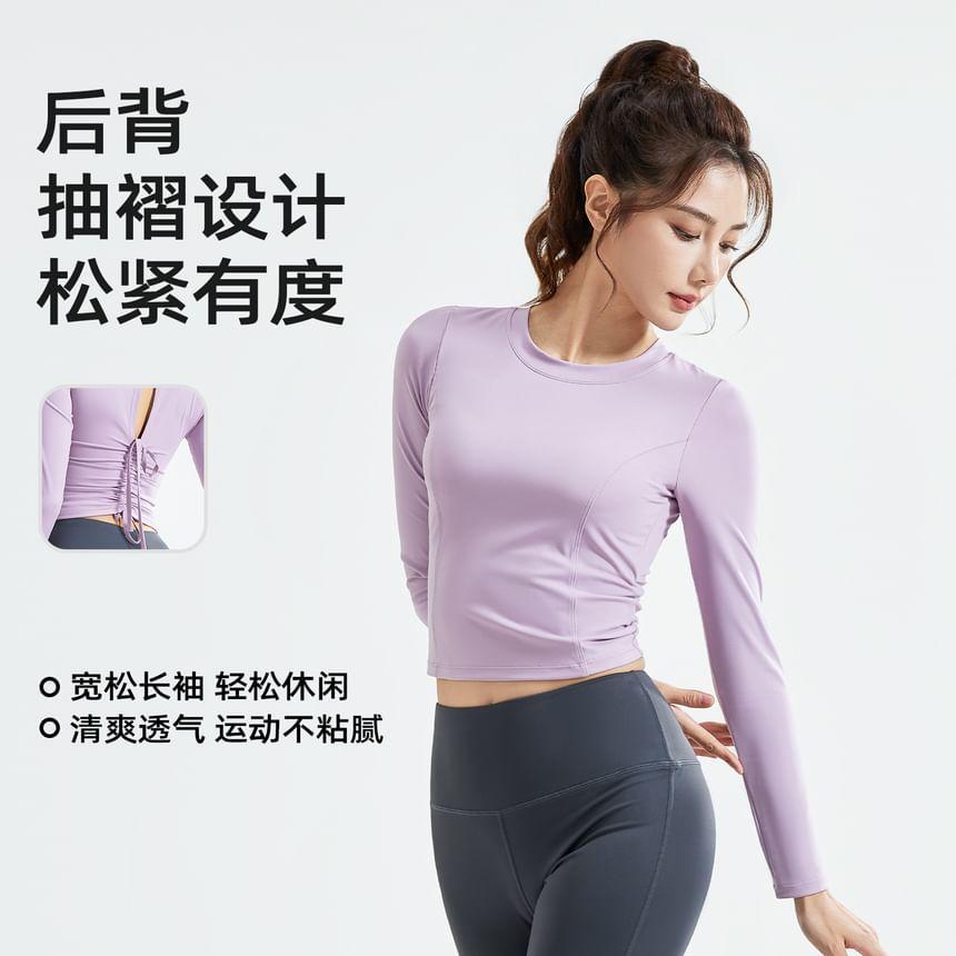 Long-Sleeve Crew Neck Plain Drawstring Cutout Back Crop Sports Top Product Image