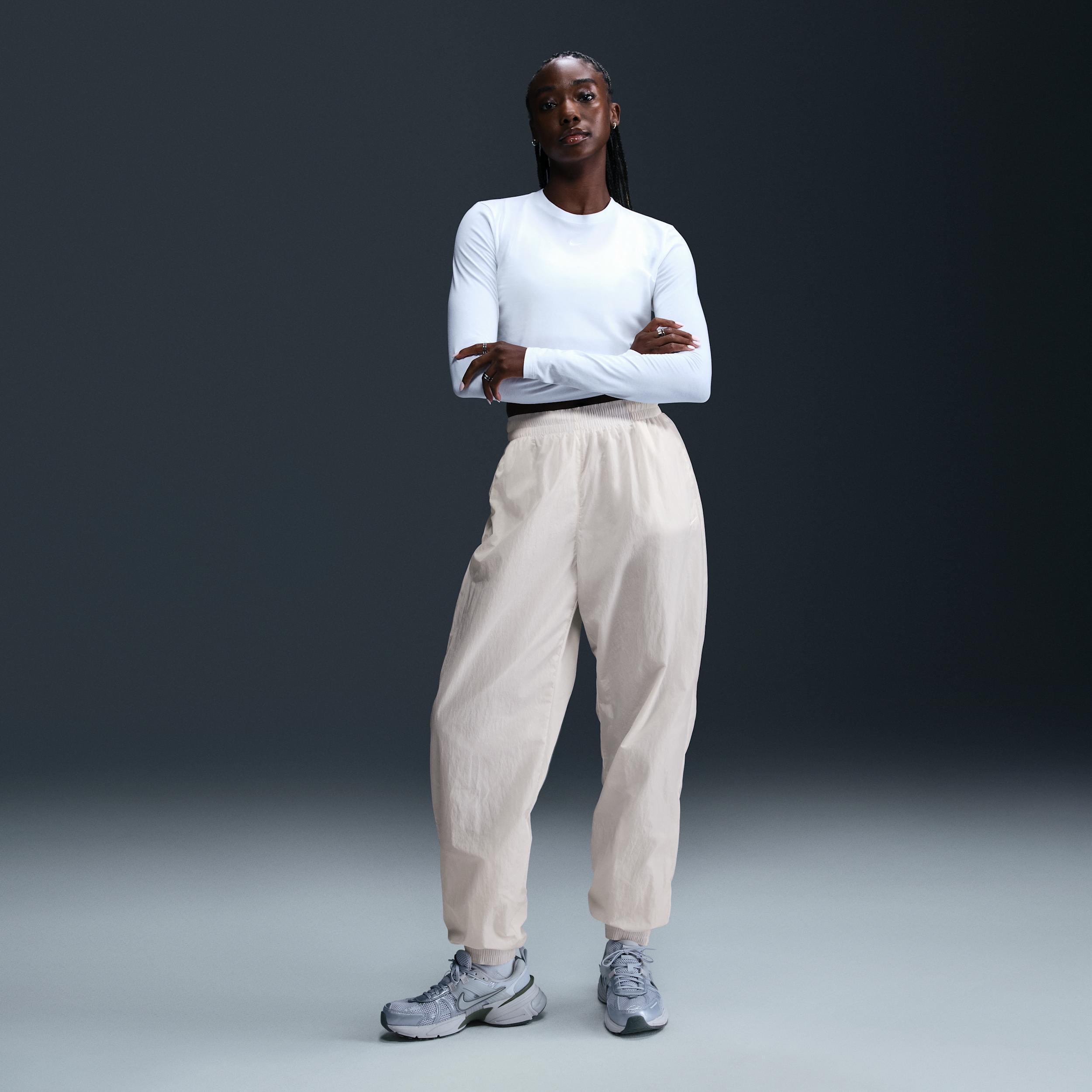 Nike Sportswear Essential Women's Mid-Rise Oversized Woven Joggers product image