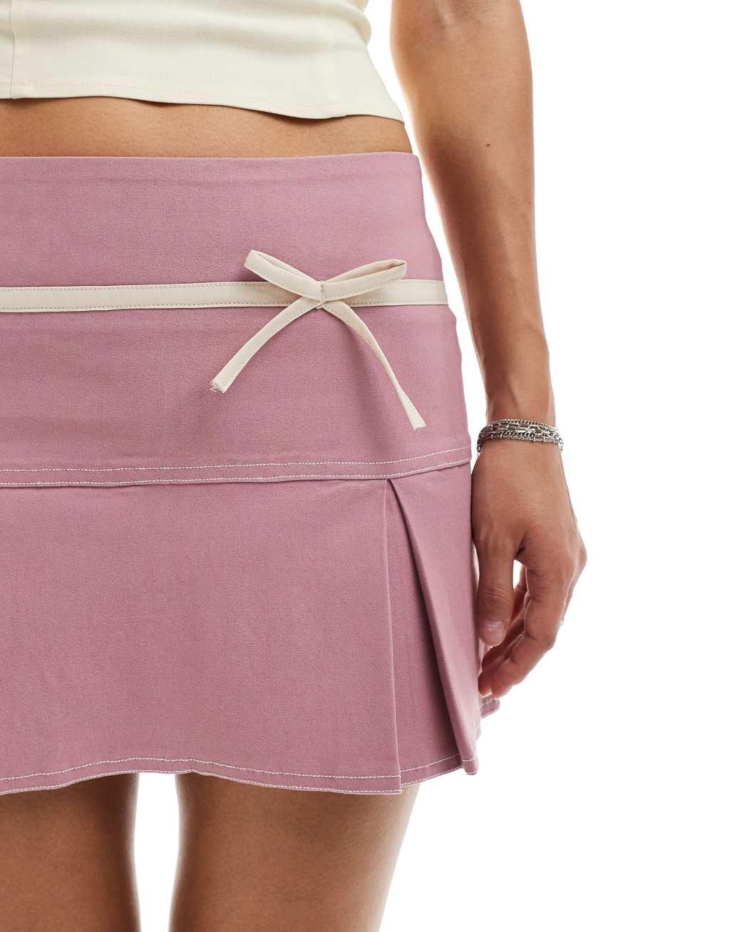 Motel bow detail mini skirt in dusky pink Product Image