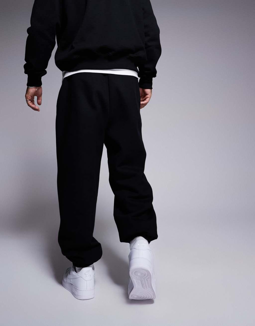 ASOS DESIGN premium heavyweight oversized sweatpants in black Product Image