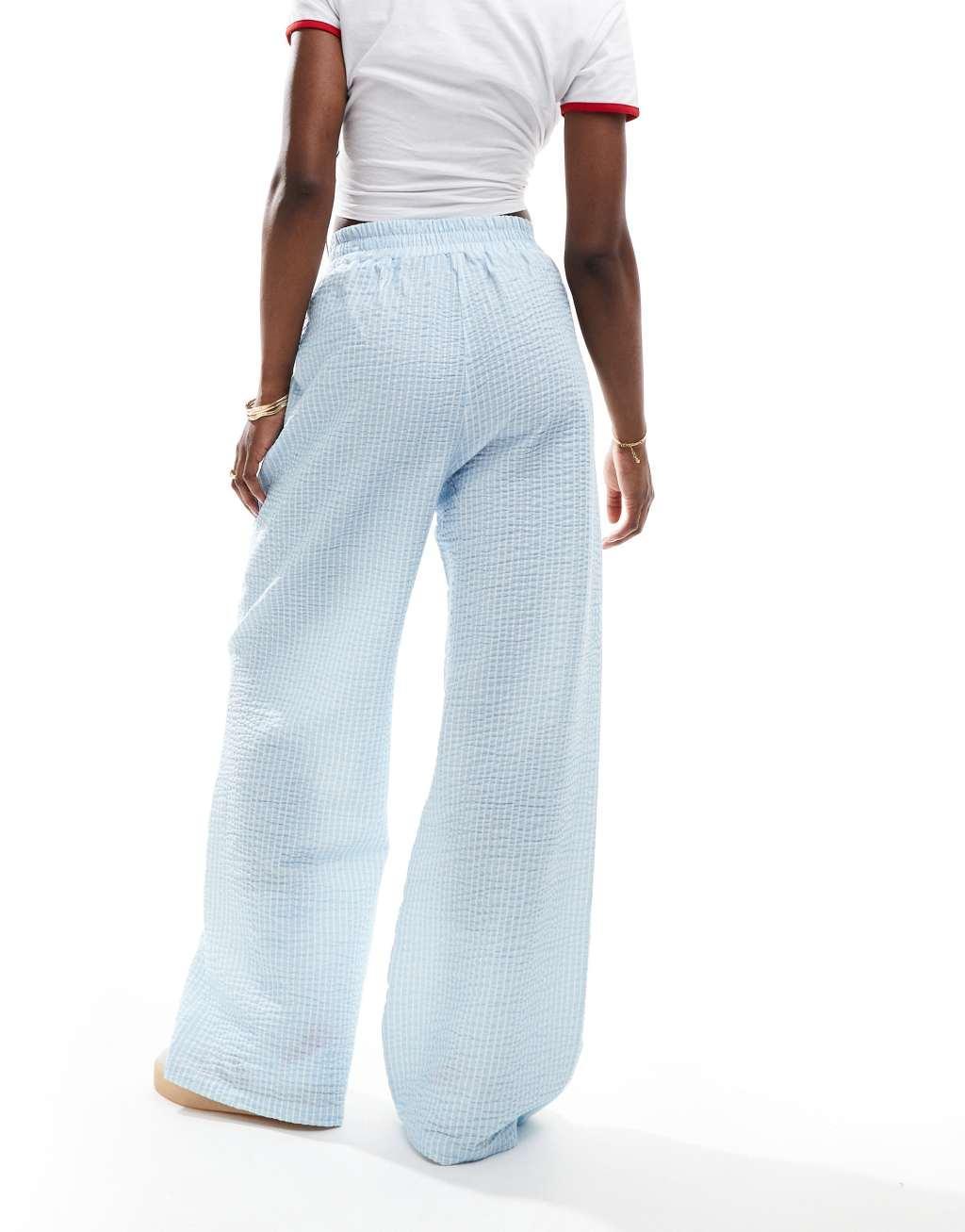 ASOS DESIGN seersucker tie waist wide leg pants in blue & white stripe Product Image