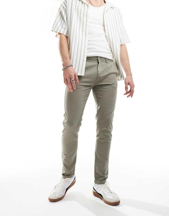 ASOS DESIGN skinny chino pants in washed khaki Product Image