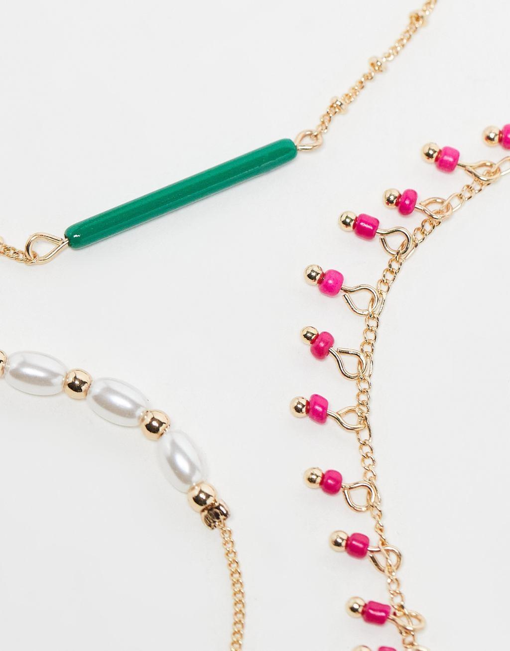 ASOS DESIGN pack of 5 anklets with pink and green bead design Product Image