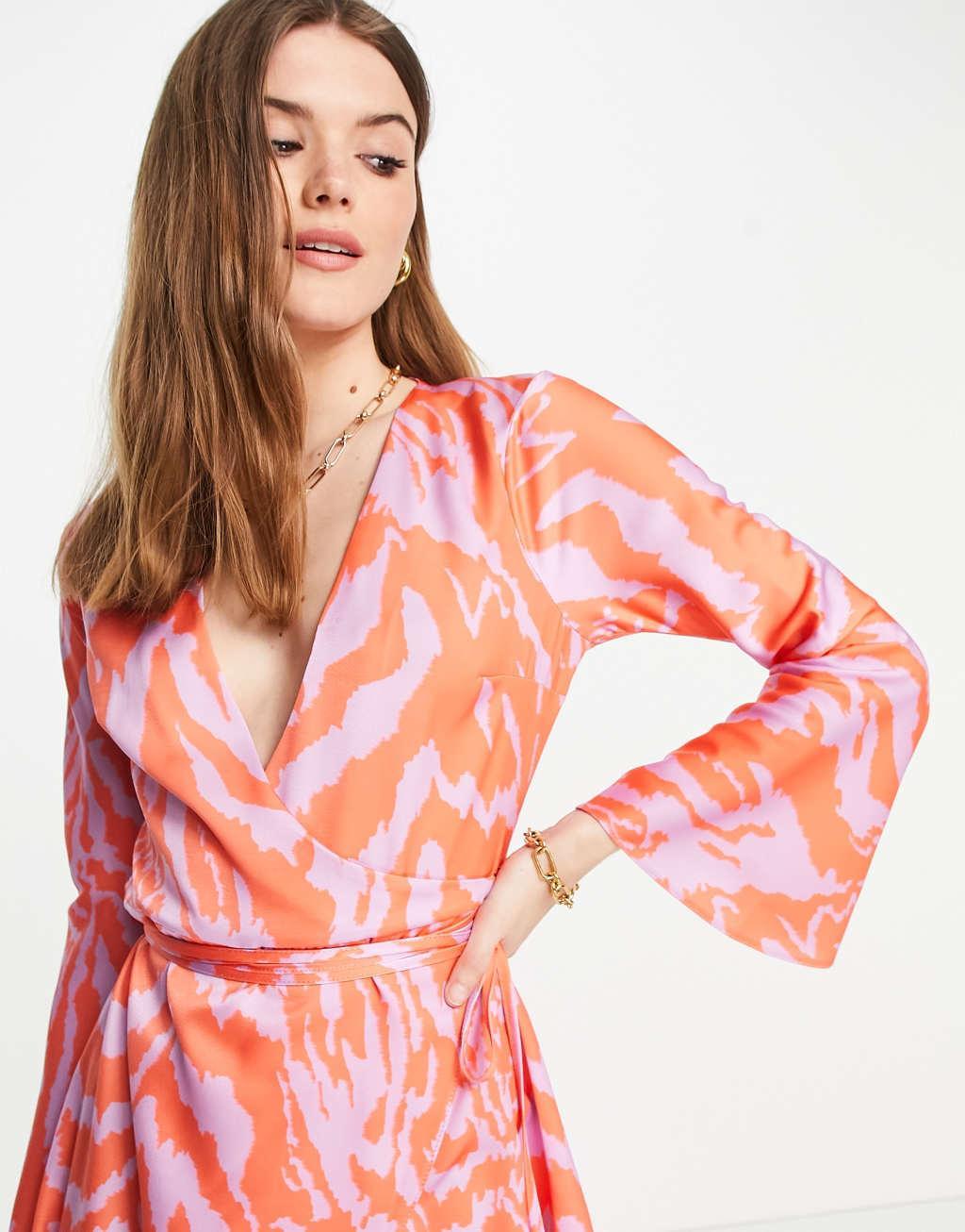 ASOS DESIGN mini wrap satin dress in orange and lilac print Product Image