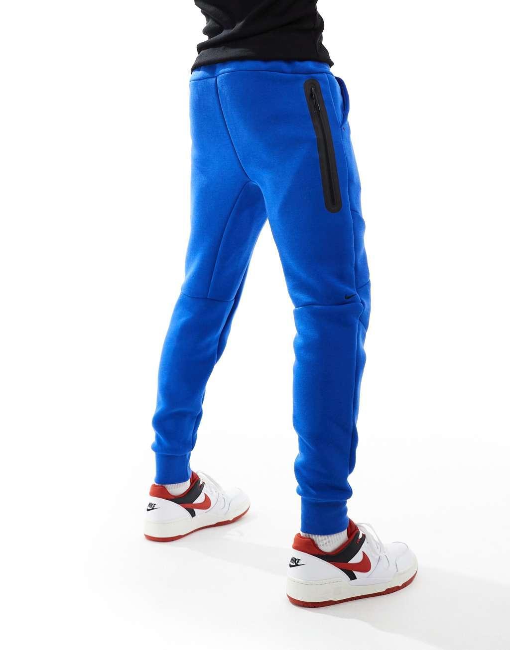 Nike Tech Fleece cuffed sweatpants in blue Product Image