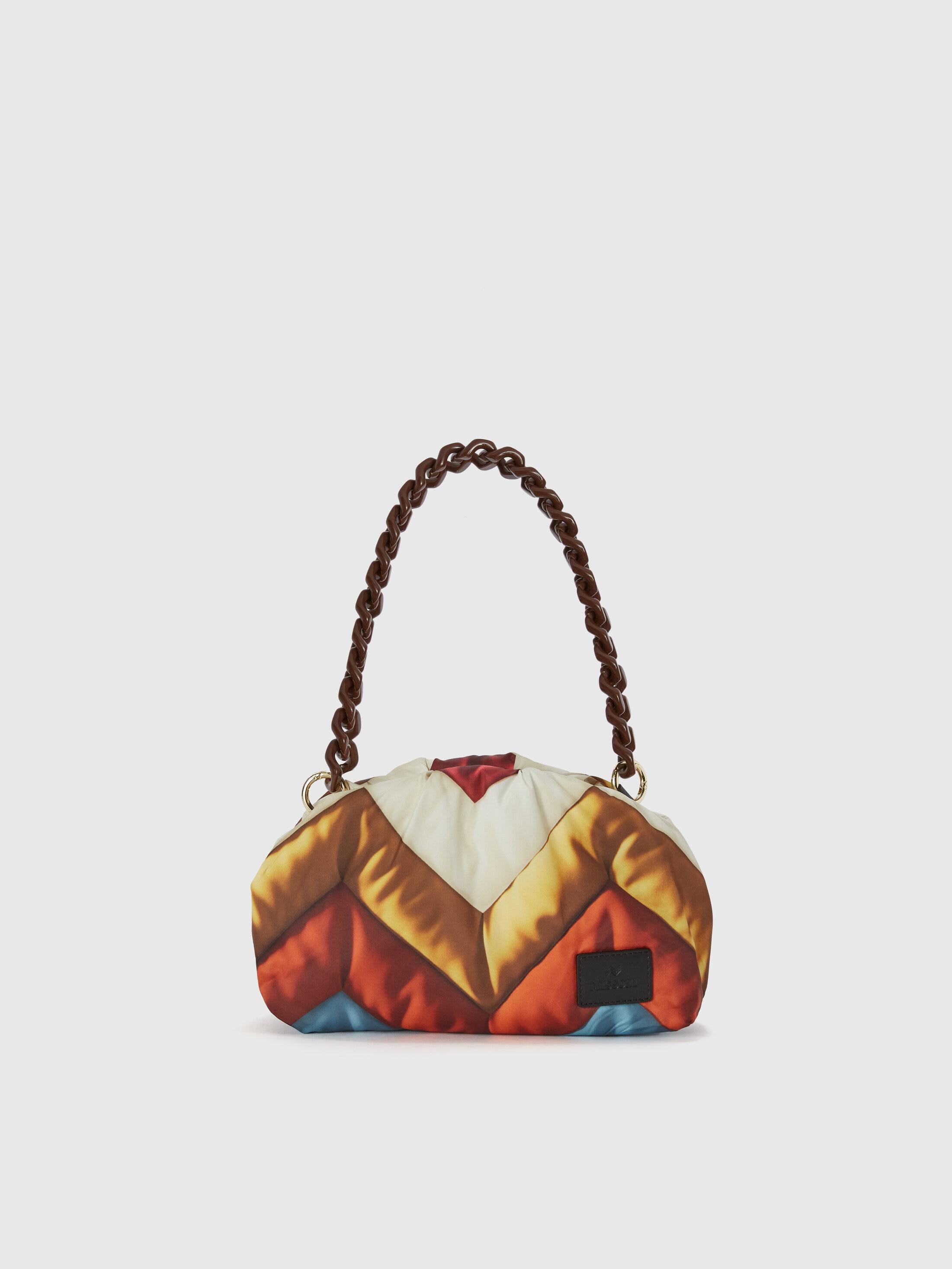 Zig zag fabric clutch with resin shoulder strap Product Image