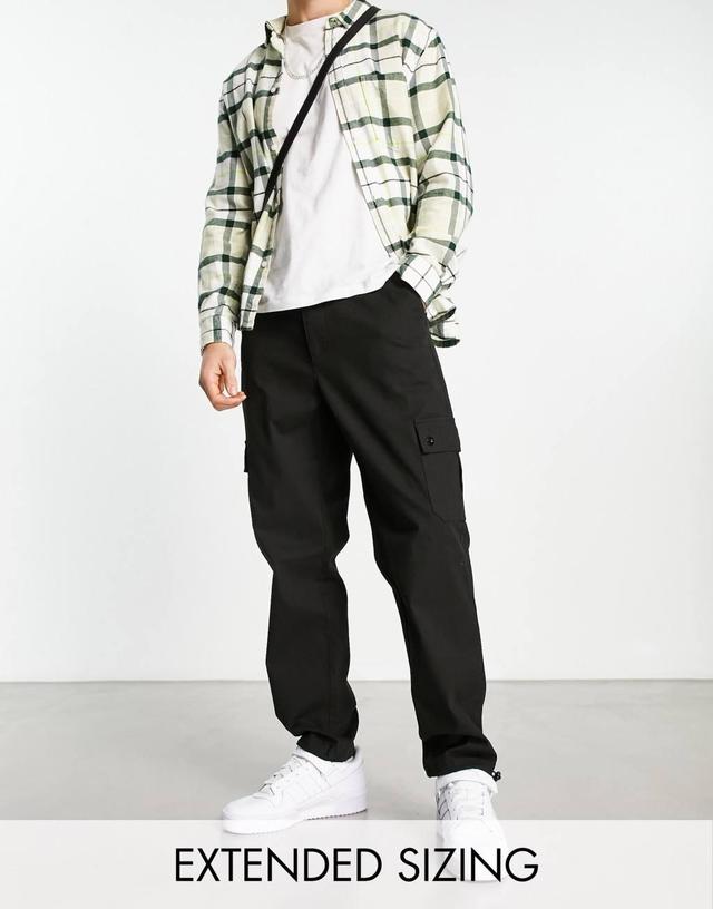 ASOS DESIGN cargo tapered pants in black with toggles Product Image