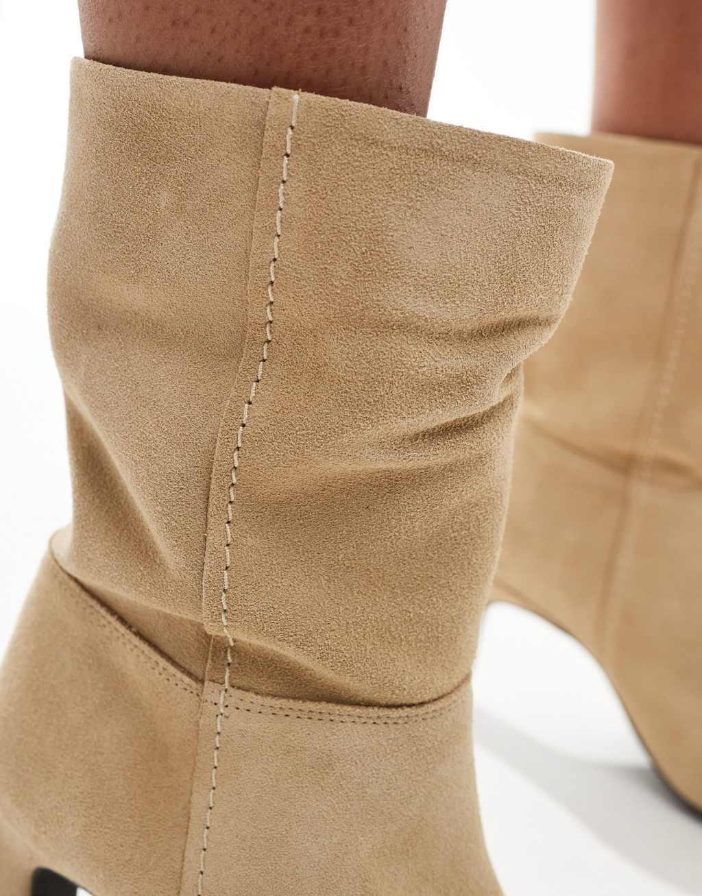 Free People slouchy suede heeled boots in cream Product Image