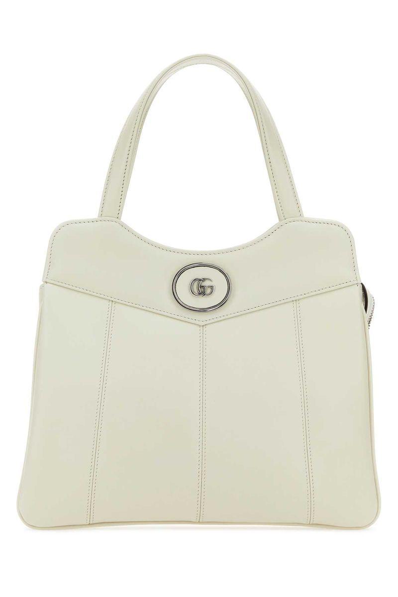 Handbags. In White Product Image