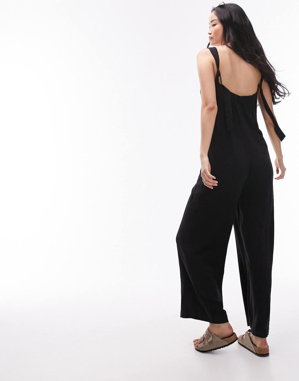 Topshop v neck button down knotted strap jumpsuit in black Product Image