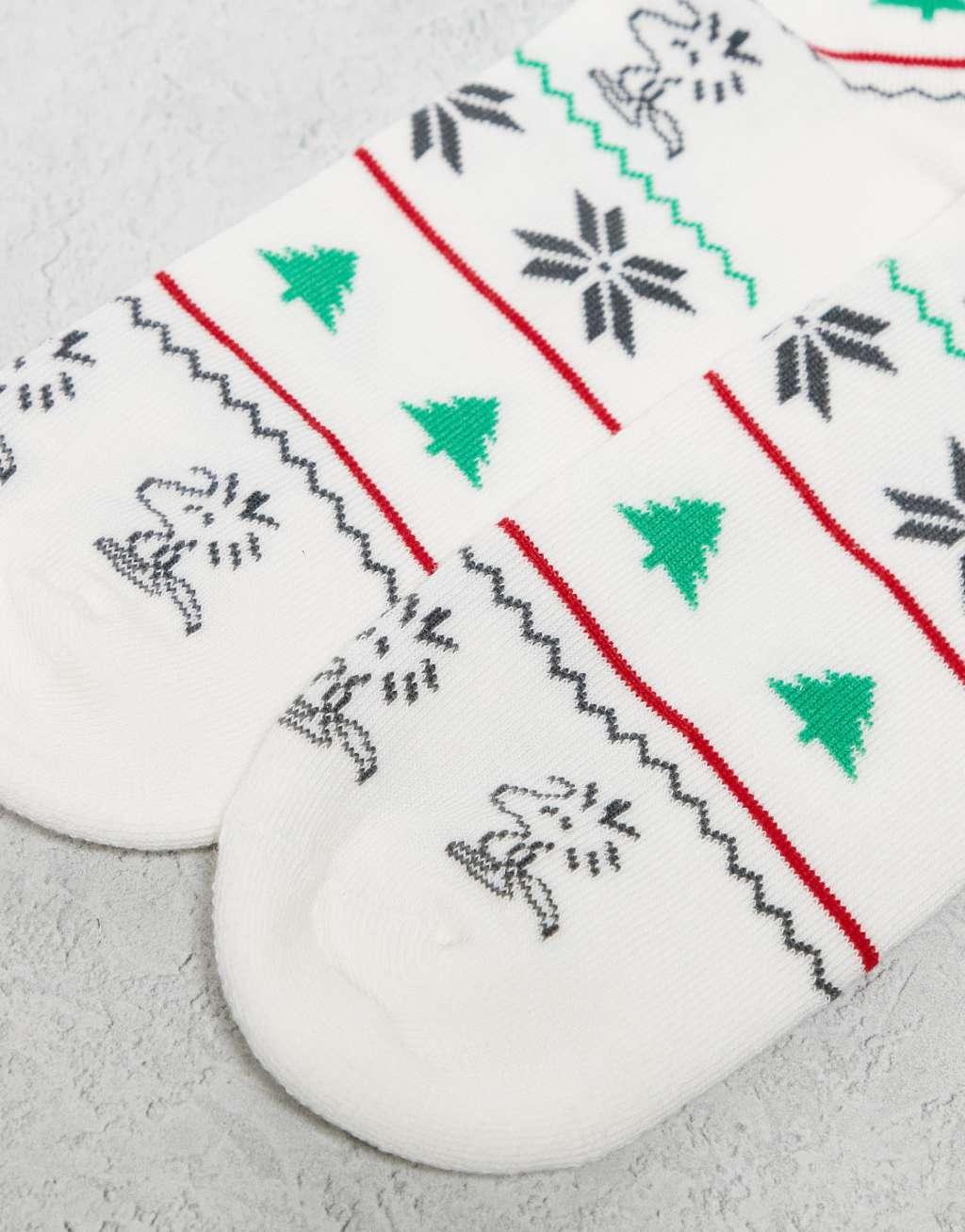 ASOS DESIGN socks with Christmas Snoopy artwork in white Product Image