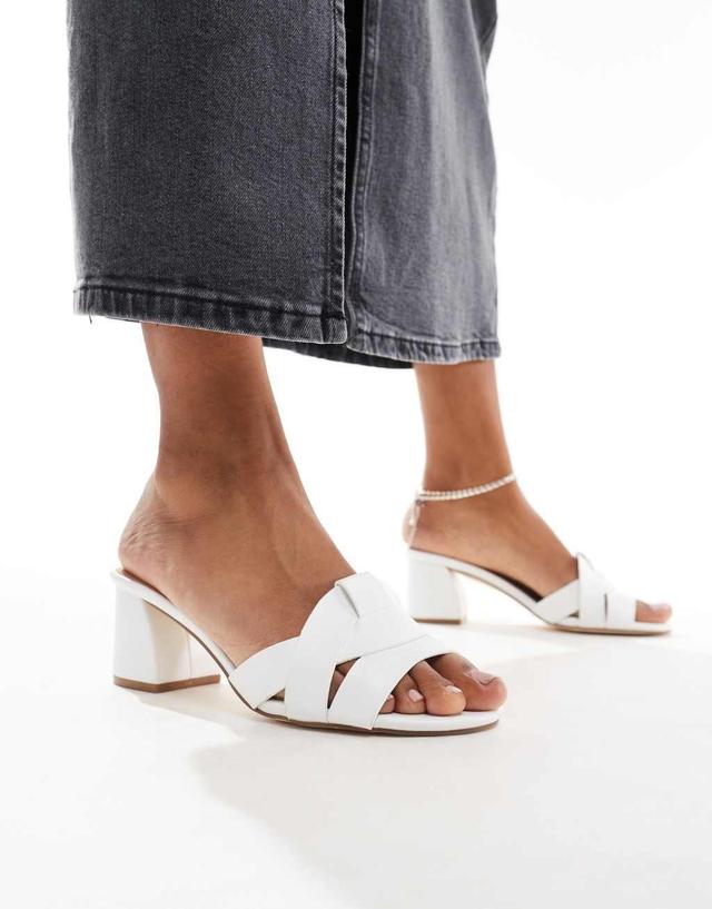 Truffle Collection block heel mule sandals in white Product Image