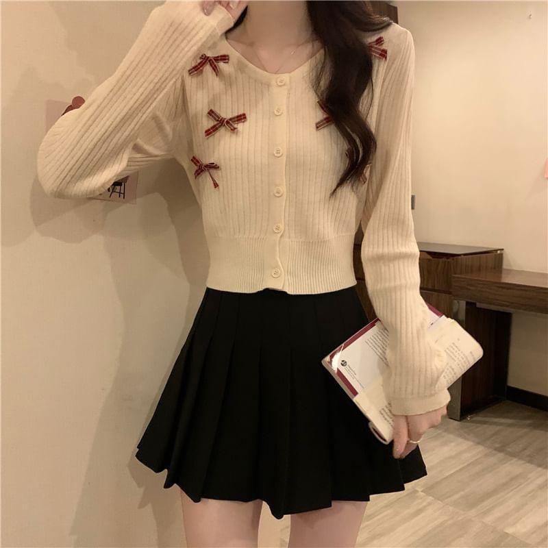 Long-Sleeve Crew Neck Bow Ribbed Button Knit Top Product Image