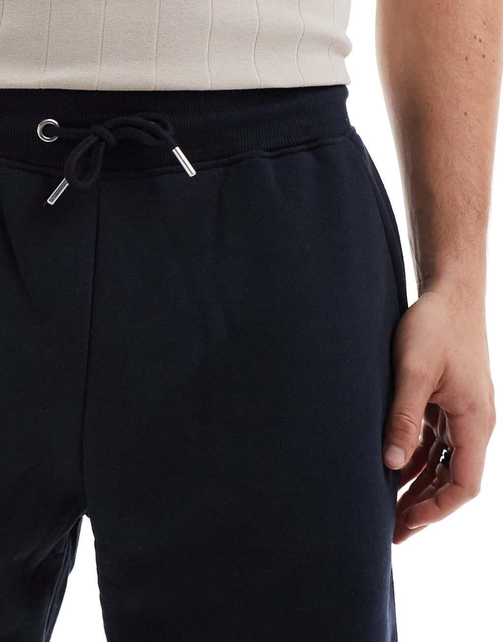 DTT jersey shorts in navy Product Image