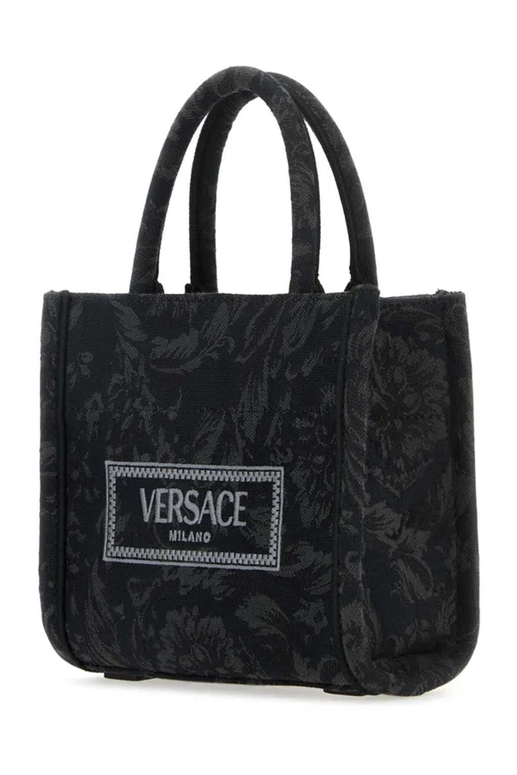 VERSACE Mini Baroque Embroidered Canvas Shopping Handbag In Printed Product Image