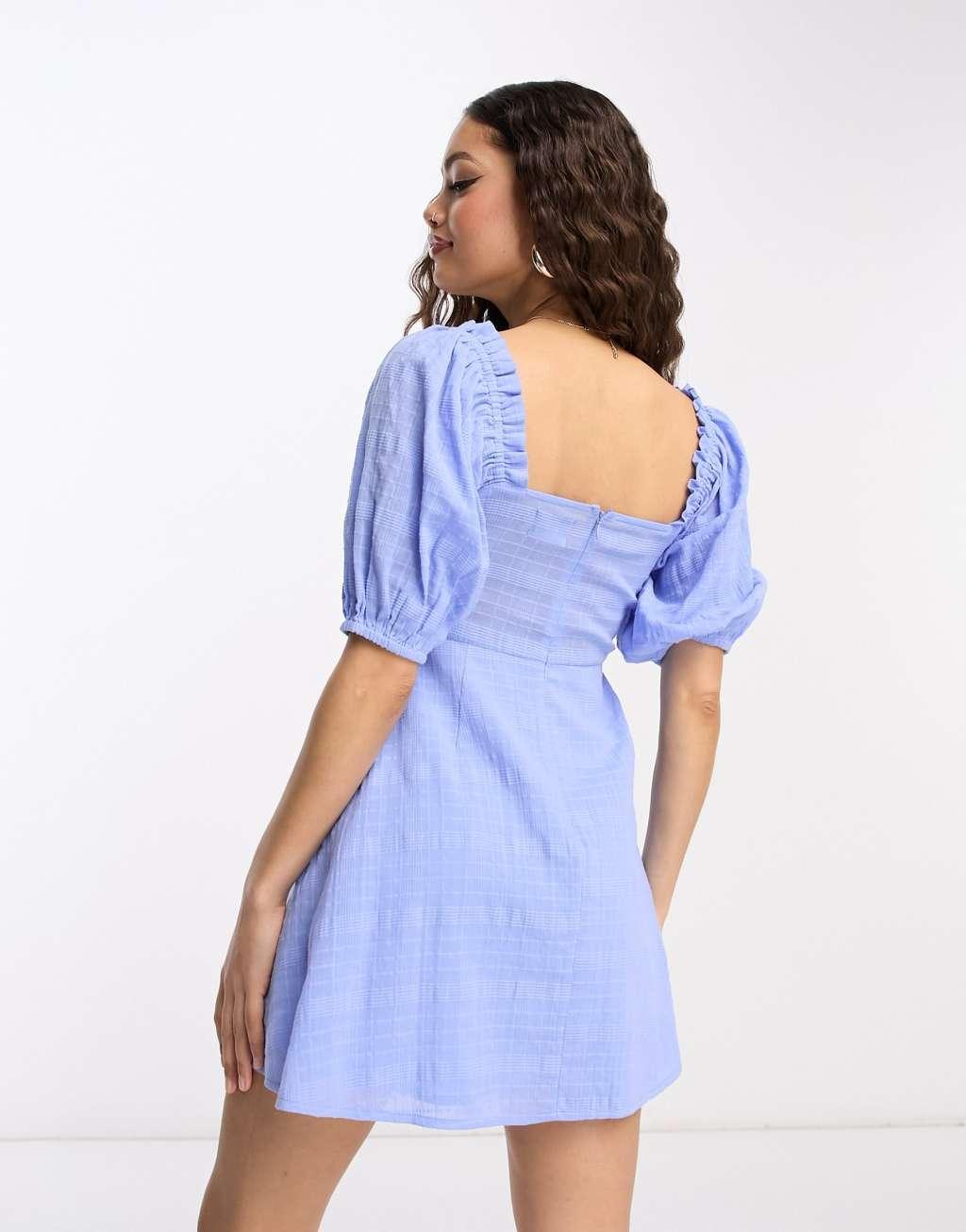 ASOS DESIGN Petite knot front mini dress in check textured in blue Product Image