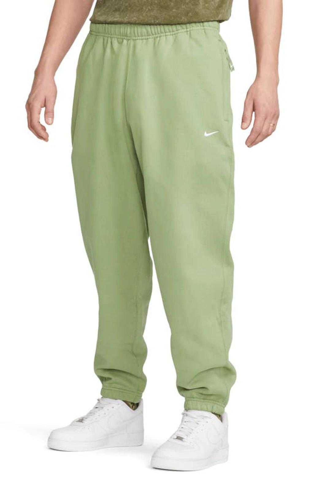 Solo Swoosh Woven Track Pants Green Product Image