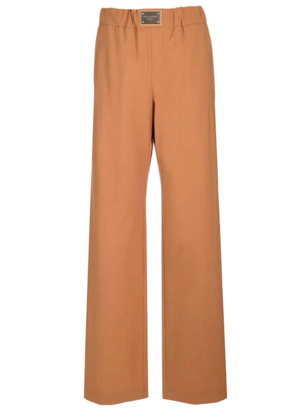 Logo Plaque Straight Leg Pants In Brown Product Image