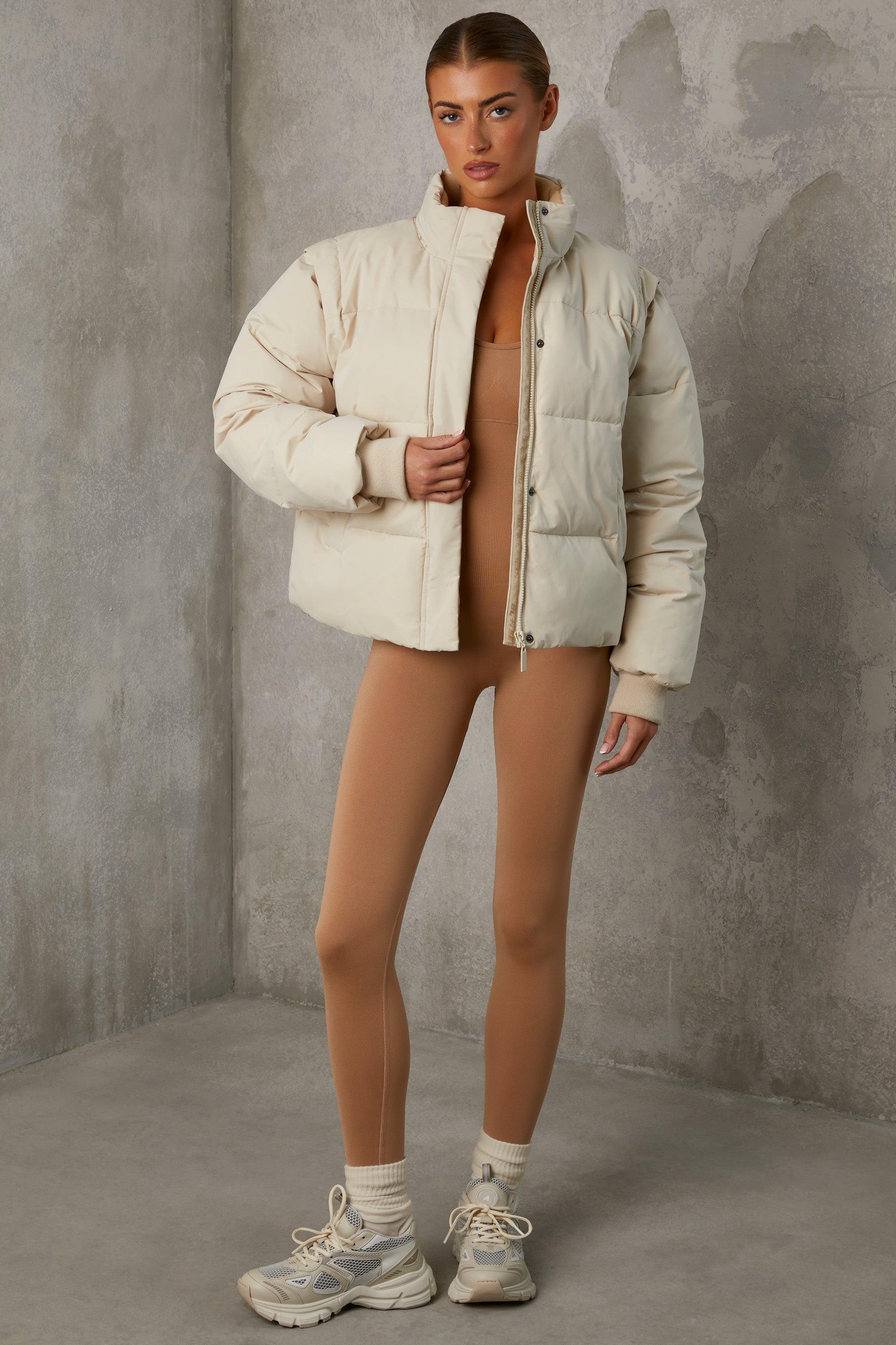 Cropped Puffer Jacket with Detachable Sleeves in Sand Product Image