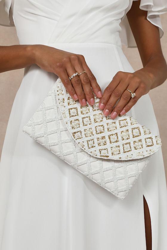 Luxurious Aspect White Beaded Pearl Clutch Product Image