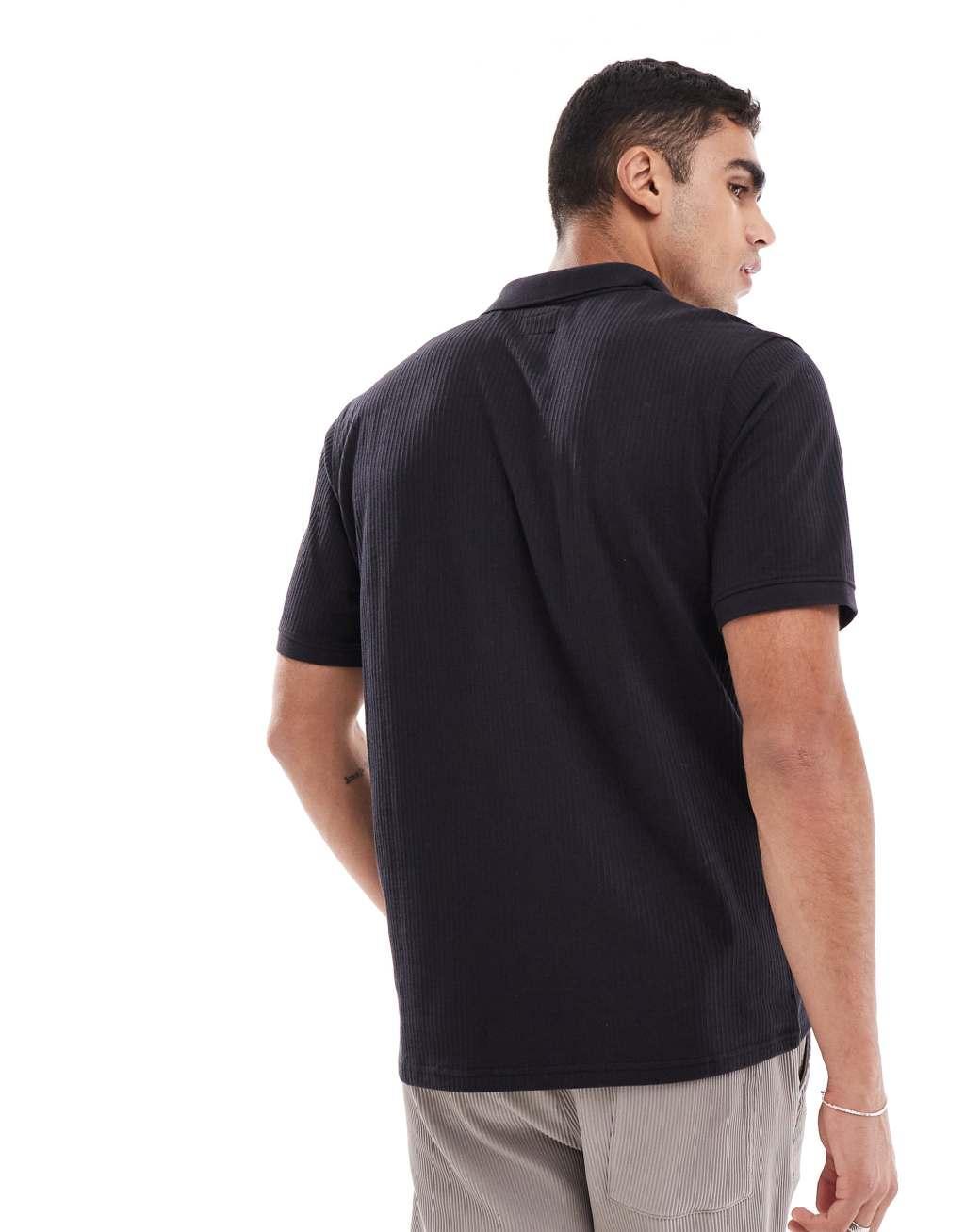 Jack & Jones plisse notch polo in black Product Image