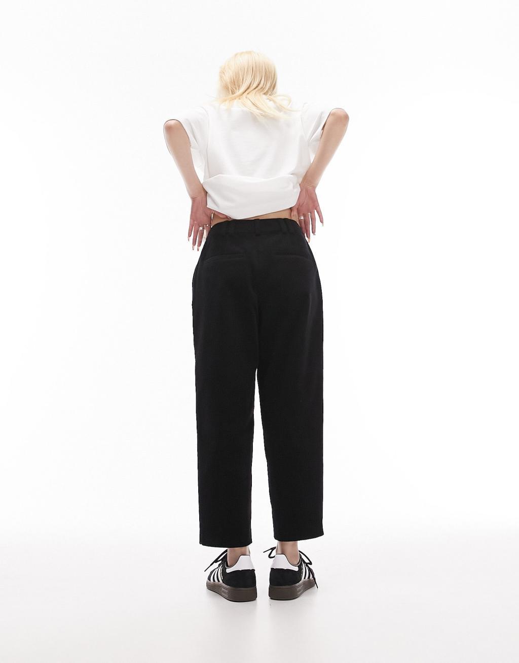 Topshop Petite cord peg pants in black Product Image