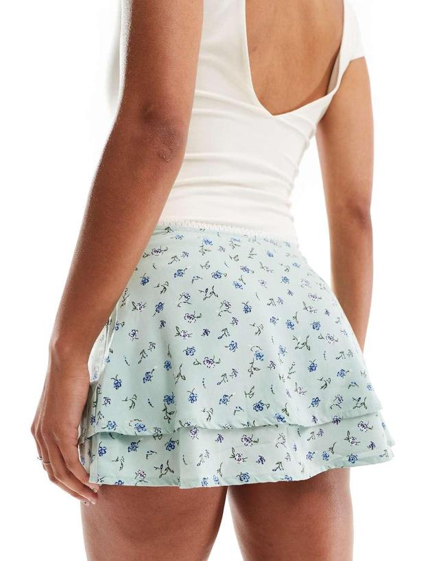 Motel Exclusive luiso tiered floral print mini skirt in pale blue Product Image