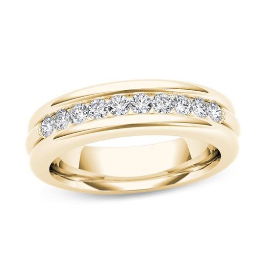 Men's 1/5 CT. T.w. Diamond Groove Wedding Band in 14K Gold Product Image