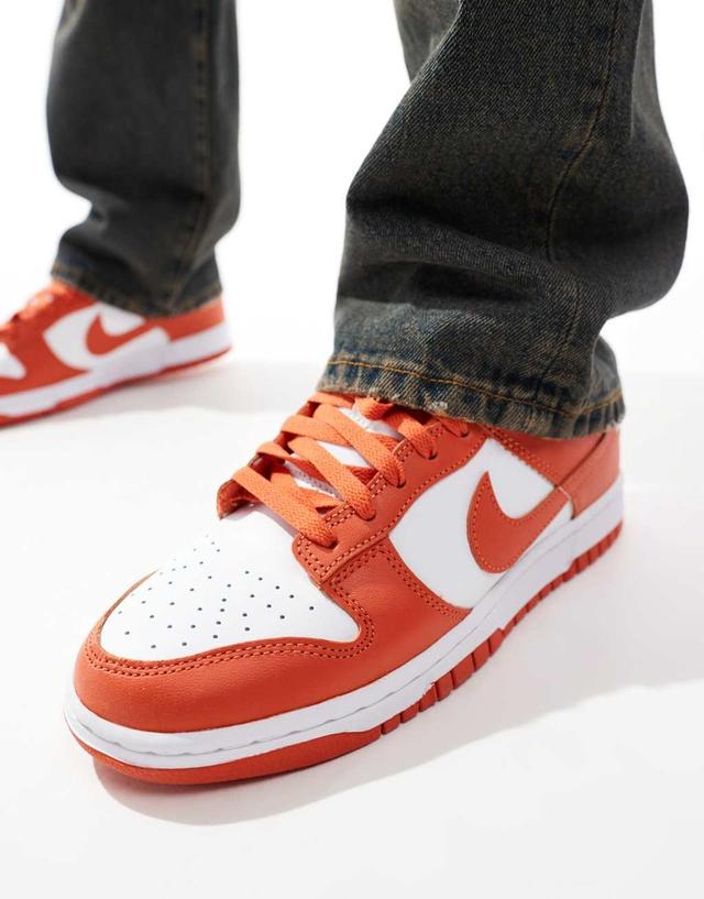 Nike Dunk Low Retro sneakers in white and orange Product Image