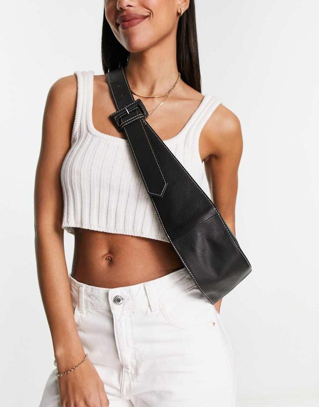 ASOS DESIGN leather curved base crossbody sling bag with contrast stitch in black Product Image