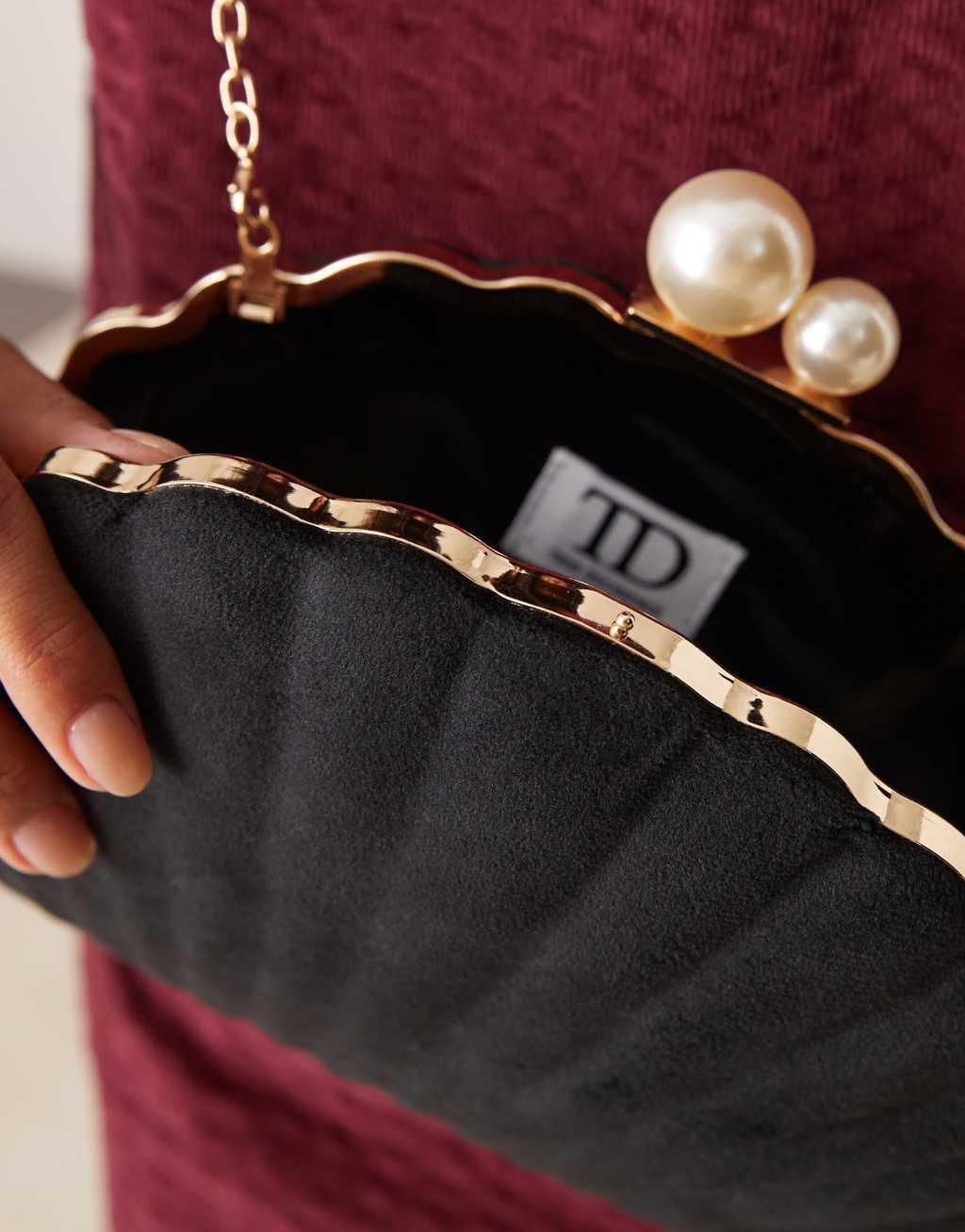 True Decadence velvet shell clutch bag with pearl clasp in black Product Image