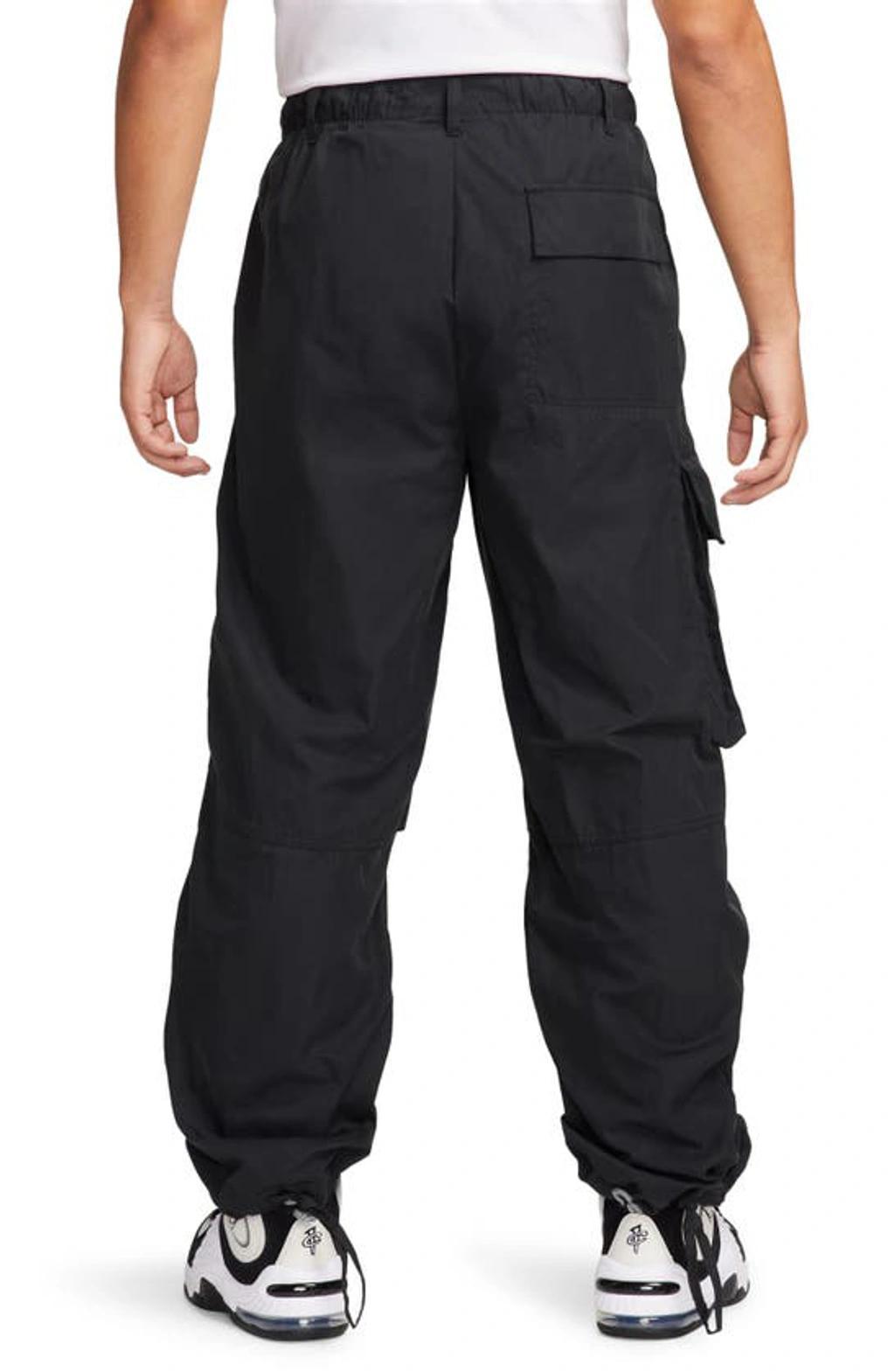 Men's  Sportswear Tech Pack Waxed Canvas Cargo Pants In Black Product Image