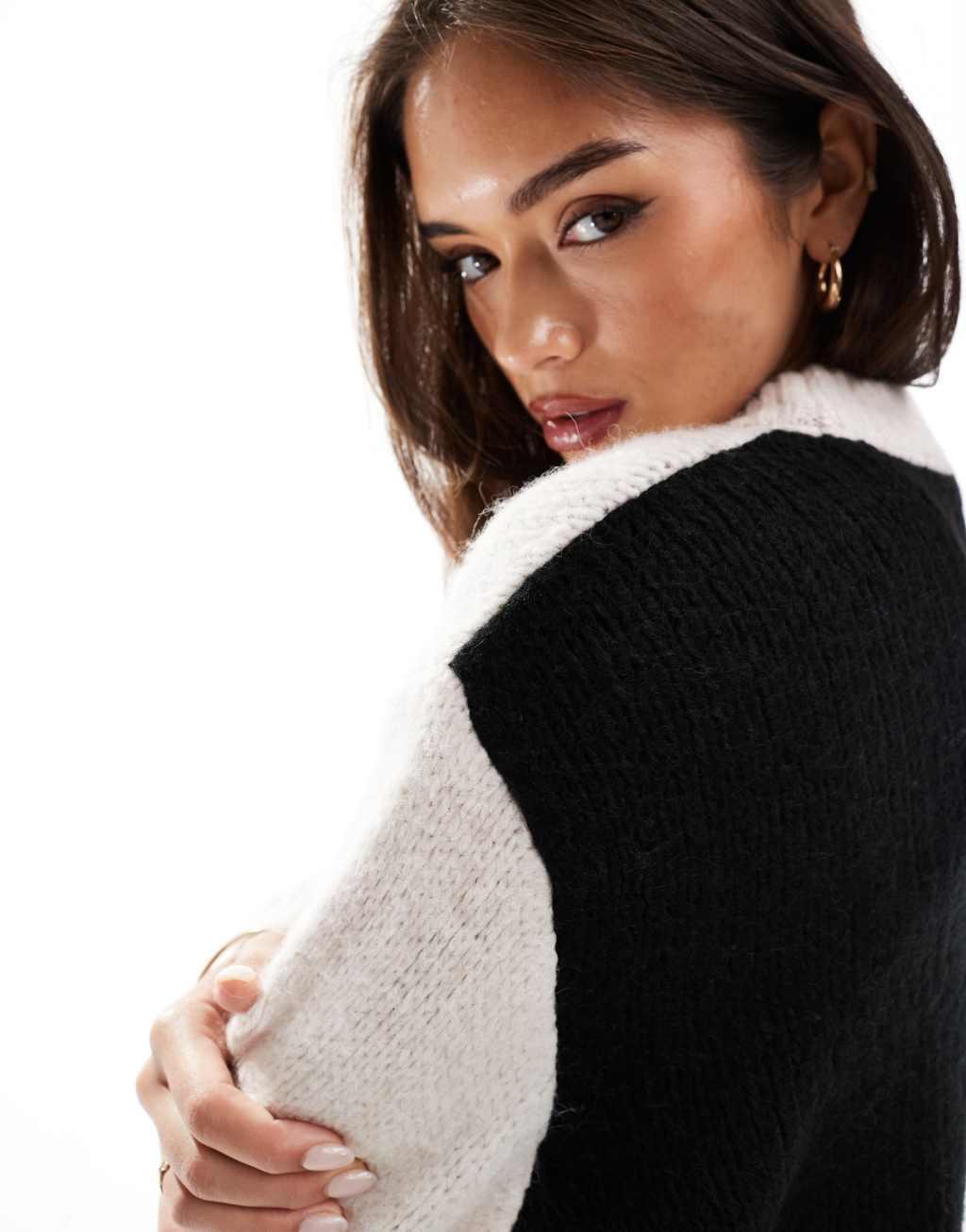 ASOS DESIGN crew neck color block sweater in black and white Product Image