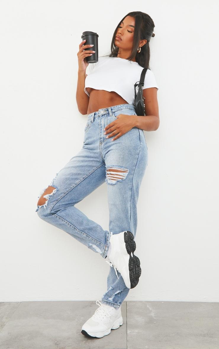 PRETTYLITTLETHING Light Blue Wash Open Knee Ripped Hem Mom Jeans product image