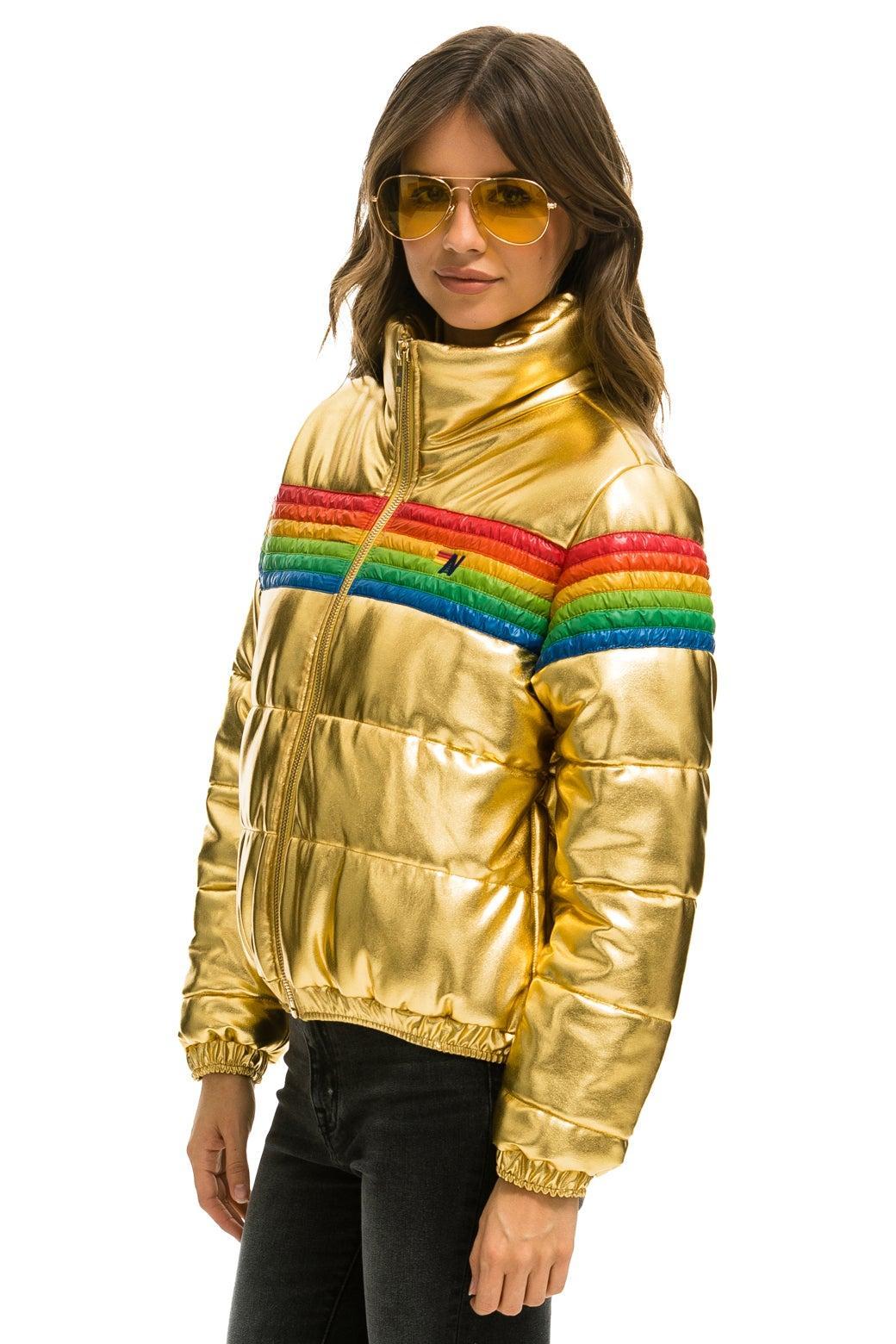 6 STRIPE LUXE APRES PUFFER JACKET - GLOSSY GOLDEN Female Product Image