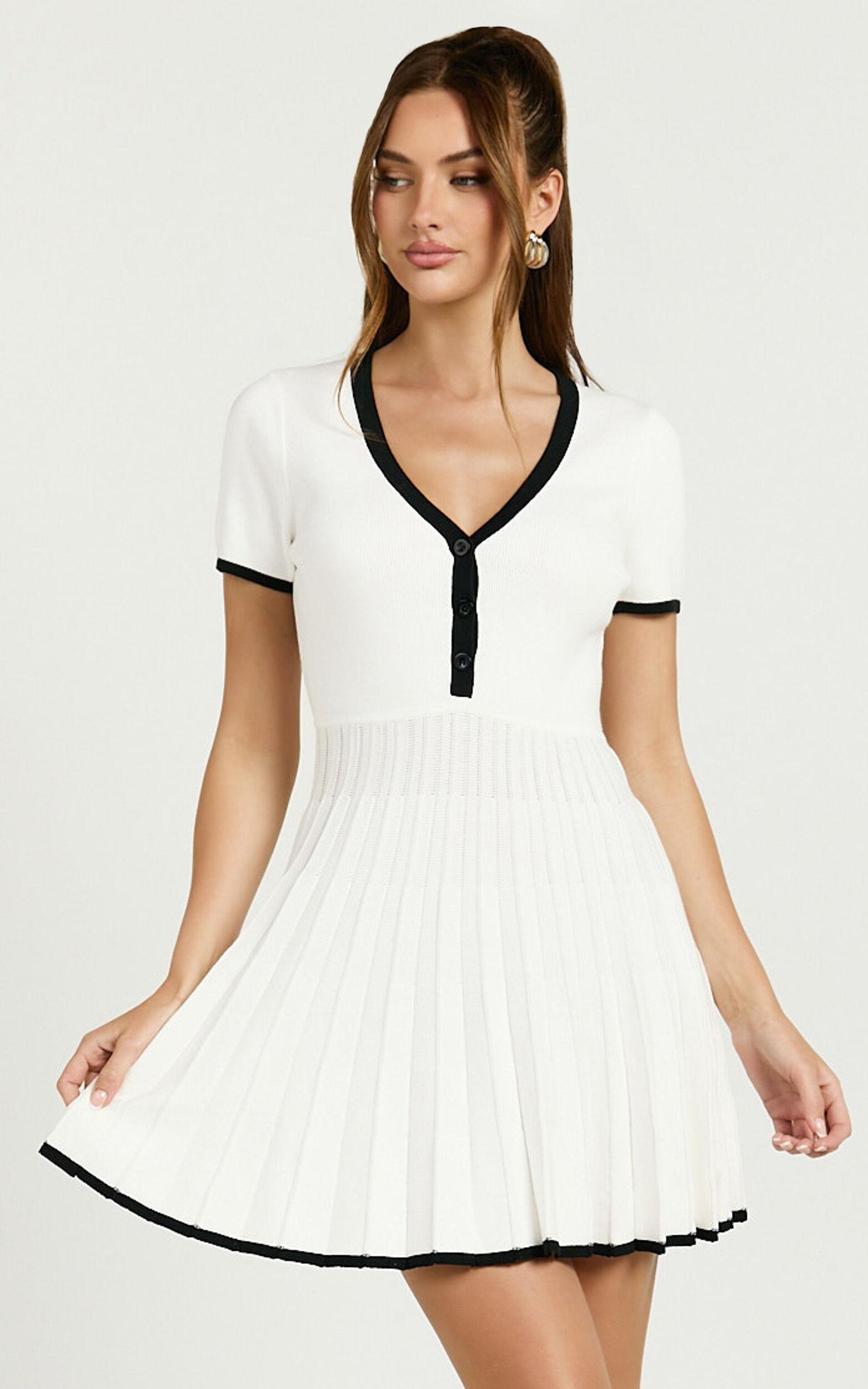 Vivienne Mini Dress - Short Sleeve Pleated Skirt Knitted Dress in Cream Product Image