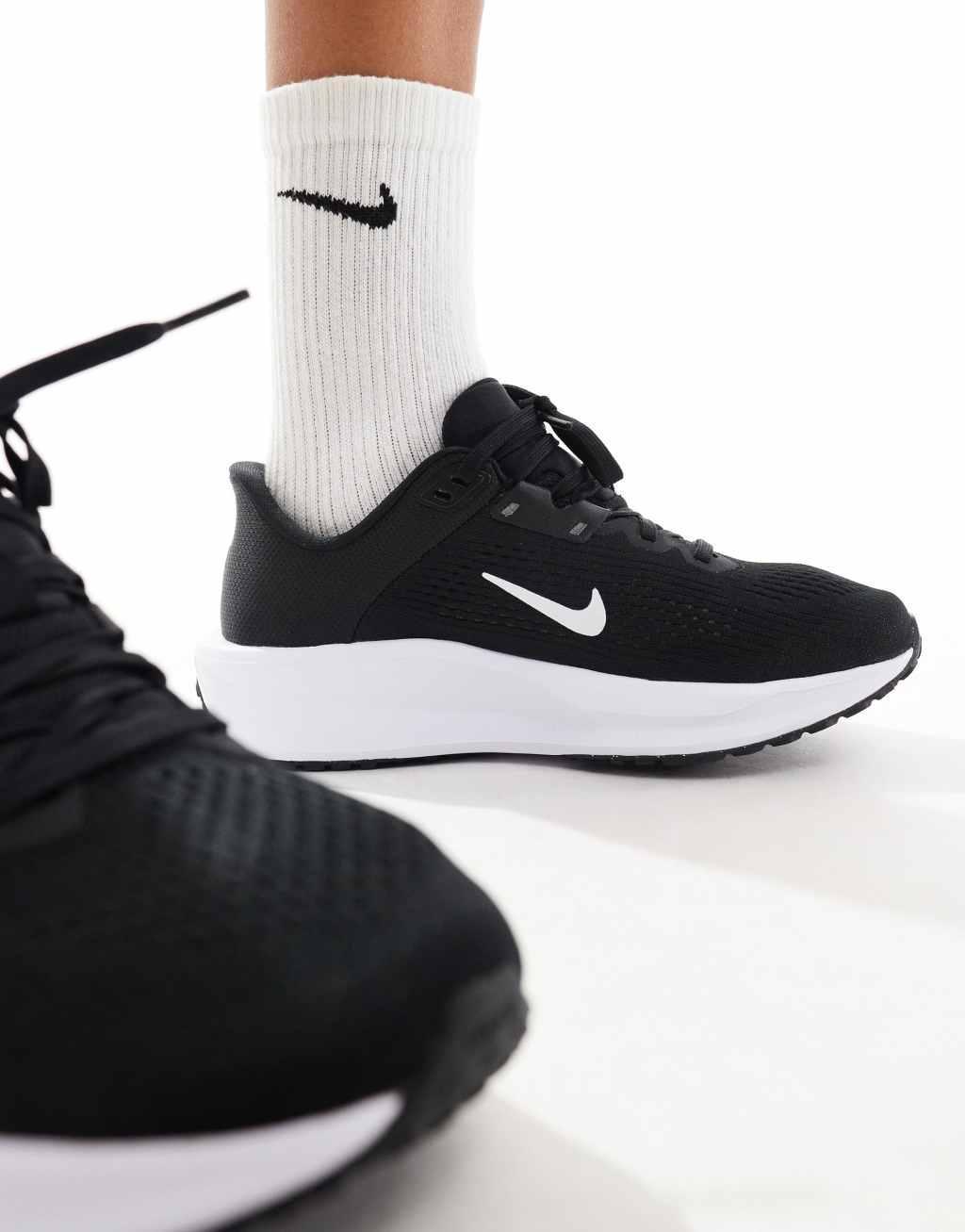 Nike Running Quest 6 sneakers in black and white Product Image