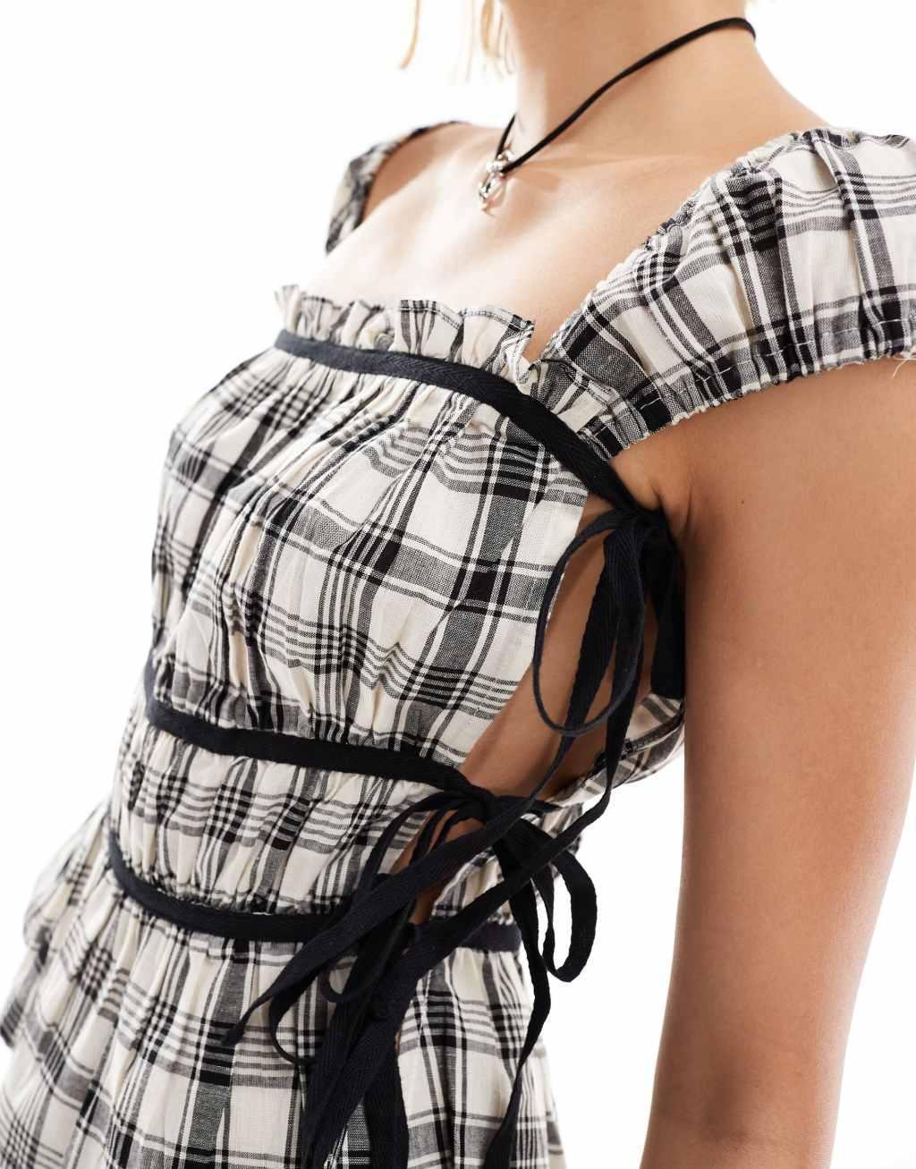 COLLUSION milkmaid top with open bow side in mono check Product Image