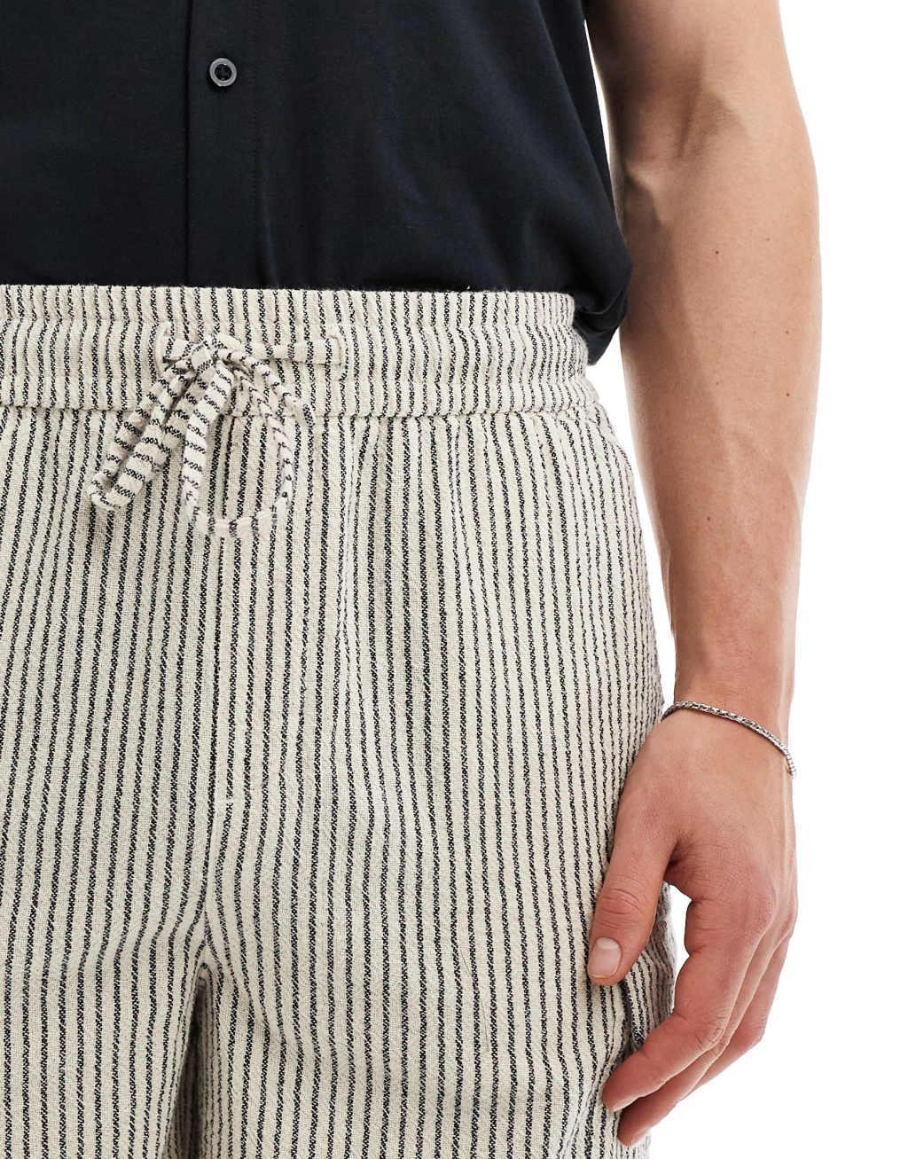 ASOS DESIGN cargo shorts in neutral stripe in brown Product Image