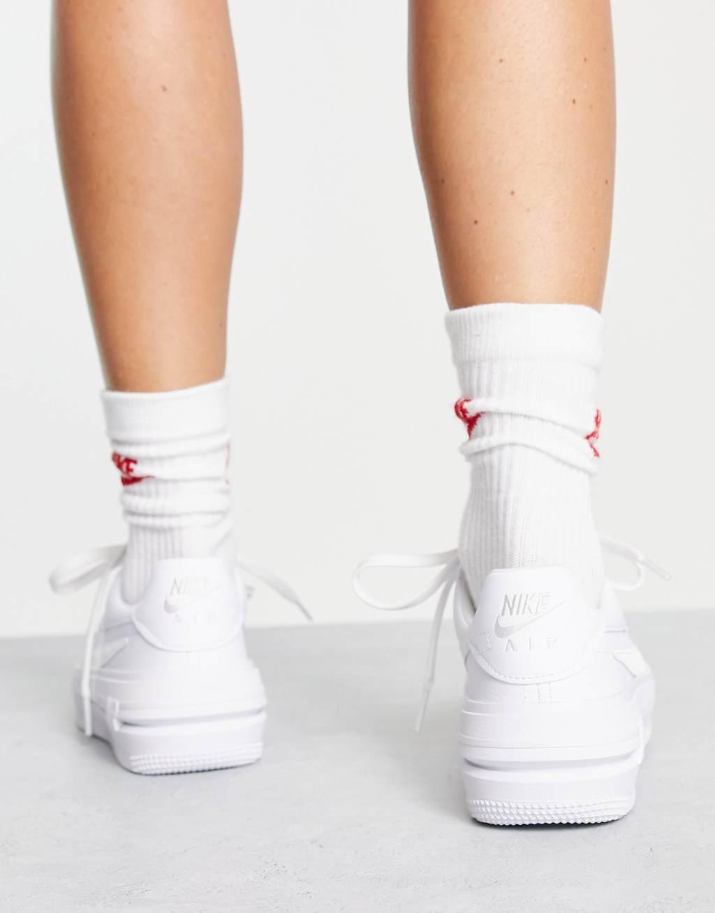 Nike Air Force 1 platform sneakers in triple white Product Image