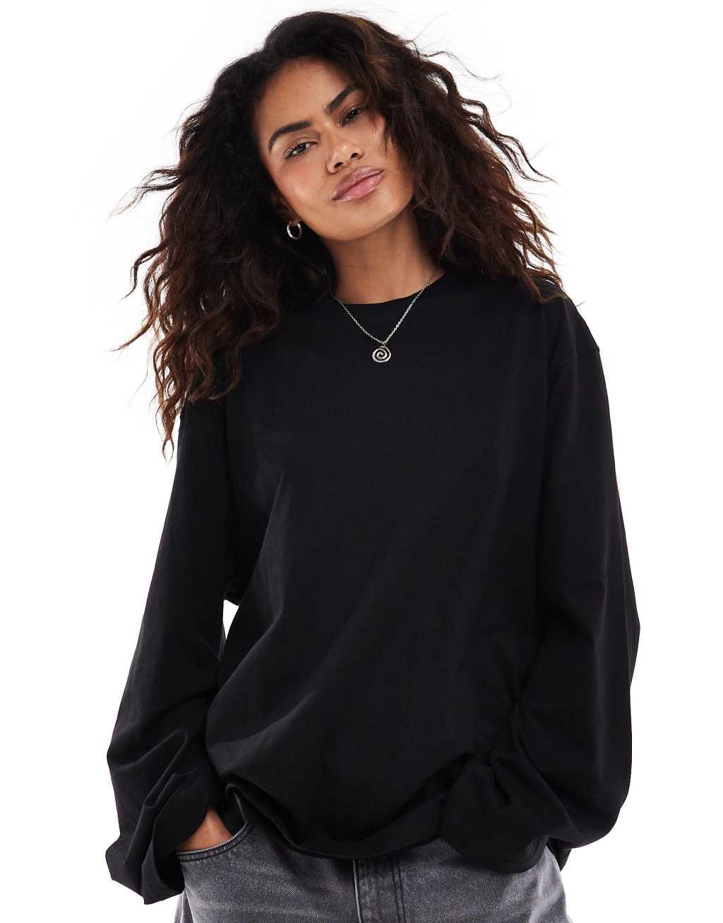 Weekday oversized long sleeve top in black Product Image